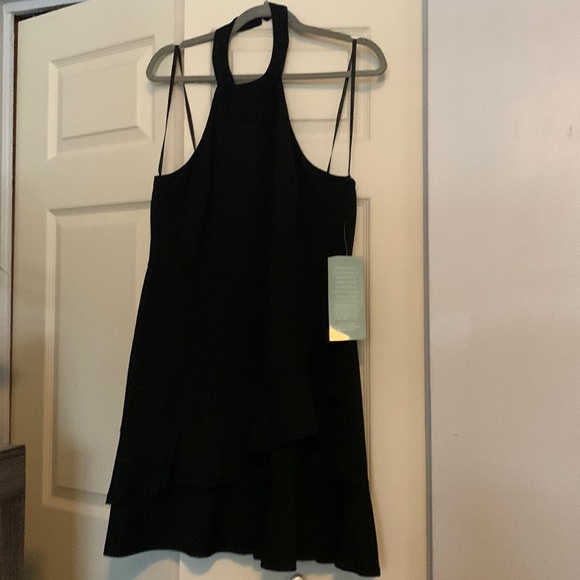 NEW black sleeveless dress. Hooks around neck. 1st pic shows strings for hanging - Picture 1 of 7